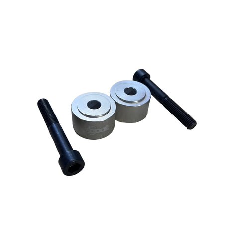 Top-down view of two 20 mm aluminum handlebar risers with a matte anodized finish, displayed with stainless steel mounting bolts and washers