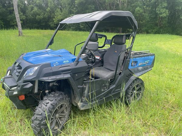 Canvas seat covers for the CFMoto UForce 800 shown on a vehicle