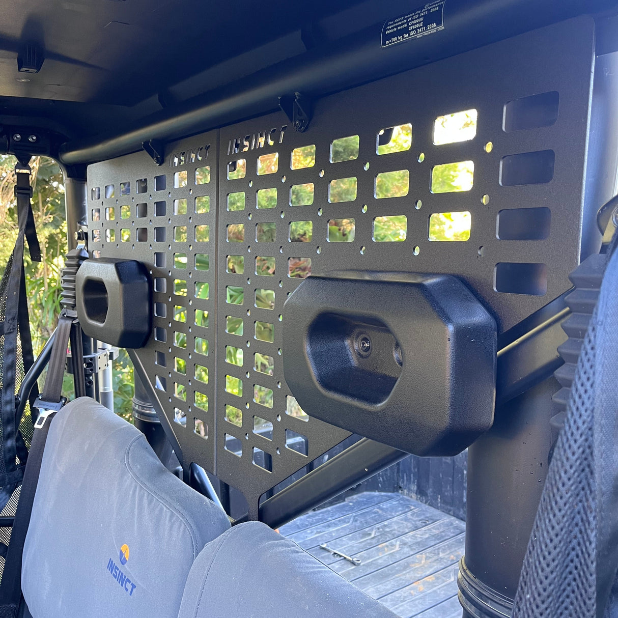 CFMoto UForce 600 with rear-mounted aluminium MOLLE panel behind headrests