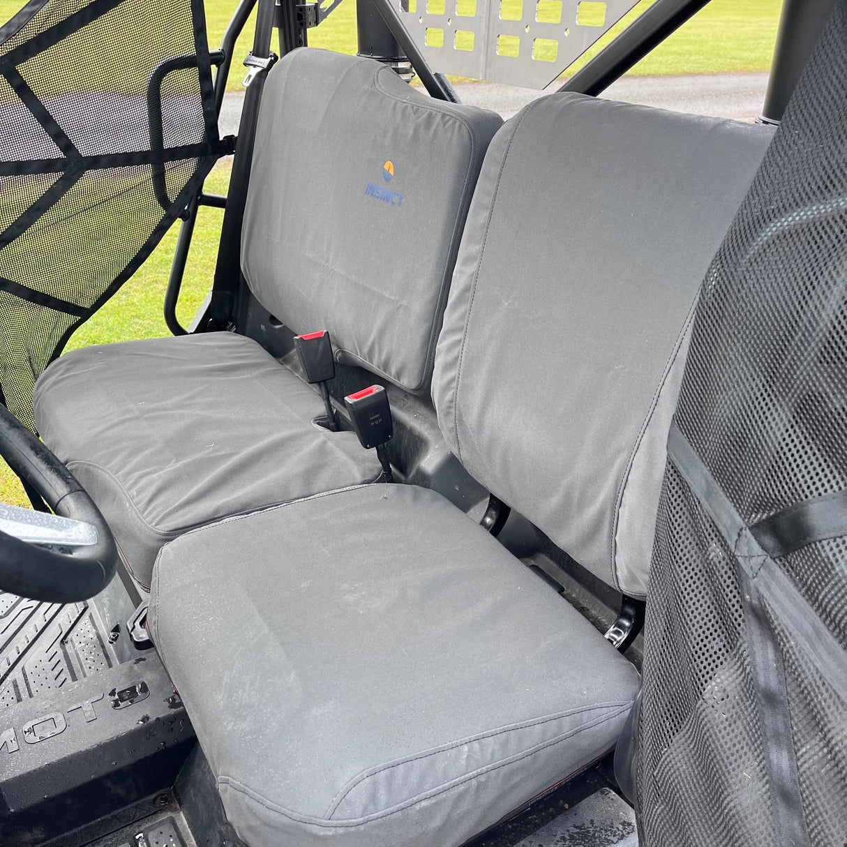 CFMoto UForce 600 canvas seat covers laid out showing Australian manufacturing quality