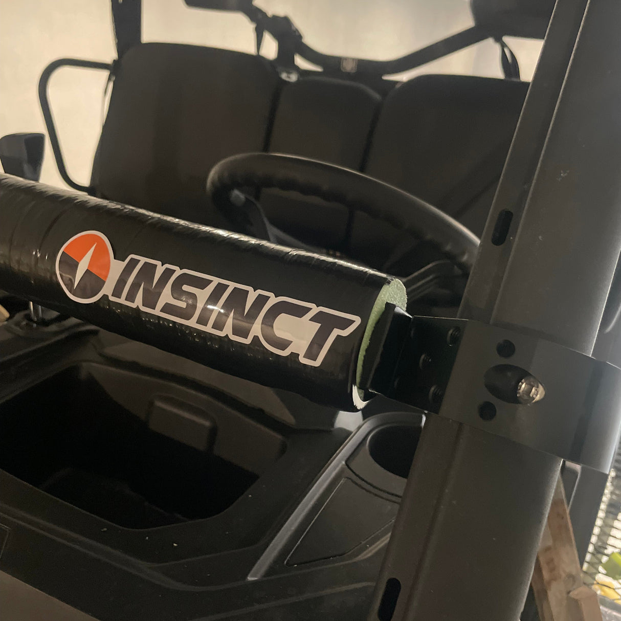 Roll frame clamp mounted on a Can-Am Defender, securing a shooting platform for stable and reliable firearm support in outdoor environments.