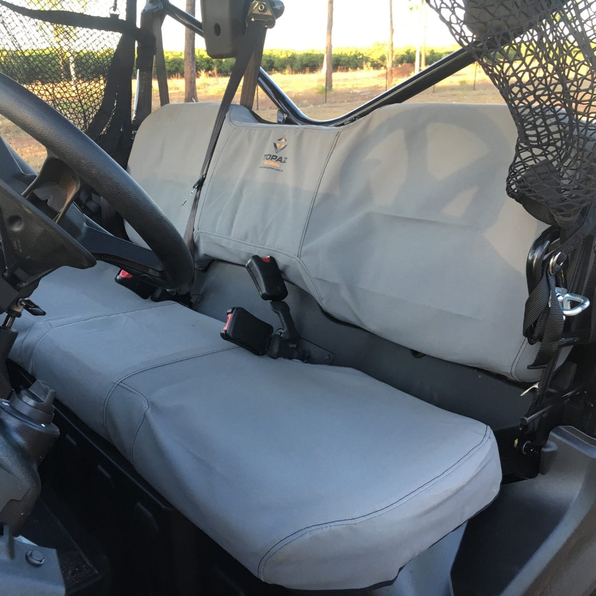 Charcoal canvas seat and backrest cover fully installed on Honda Pioneer 1000‑3 model and 1000-5
