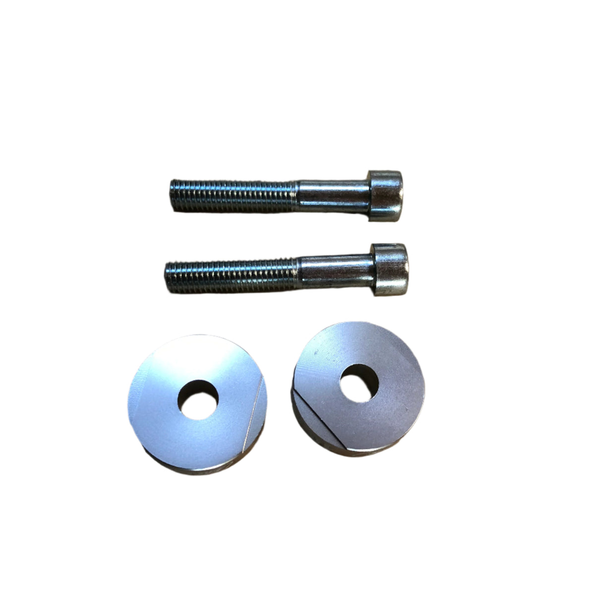 Handlebar risers displayed next to included hardware kit