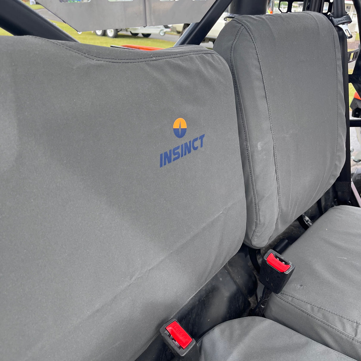 Close-up of tight stitching and tailored fit of canvas seat covers on CFMoto UForce 600