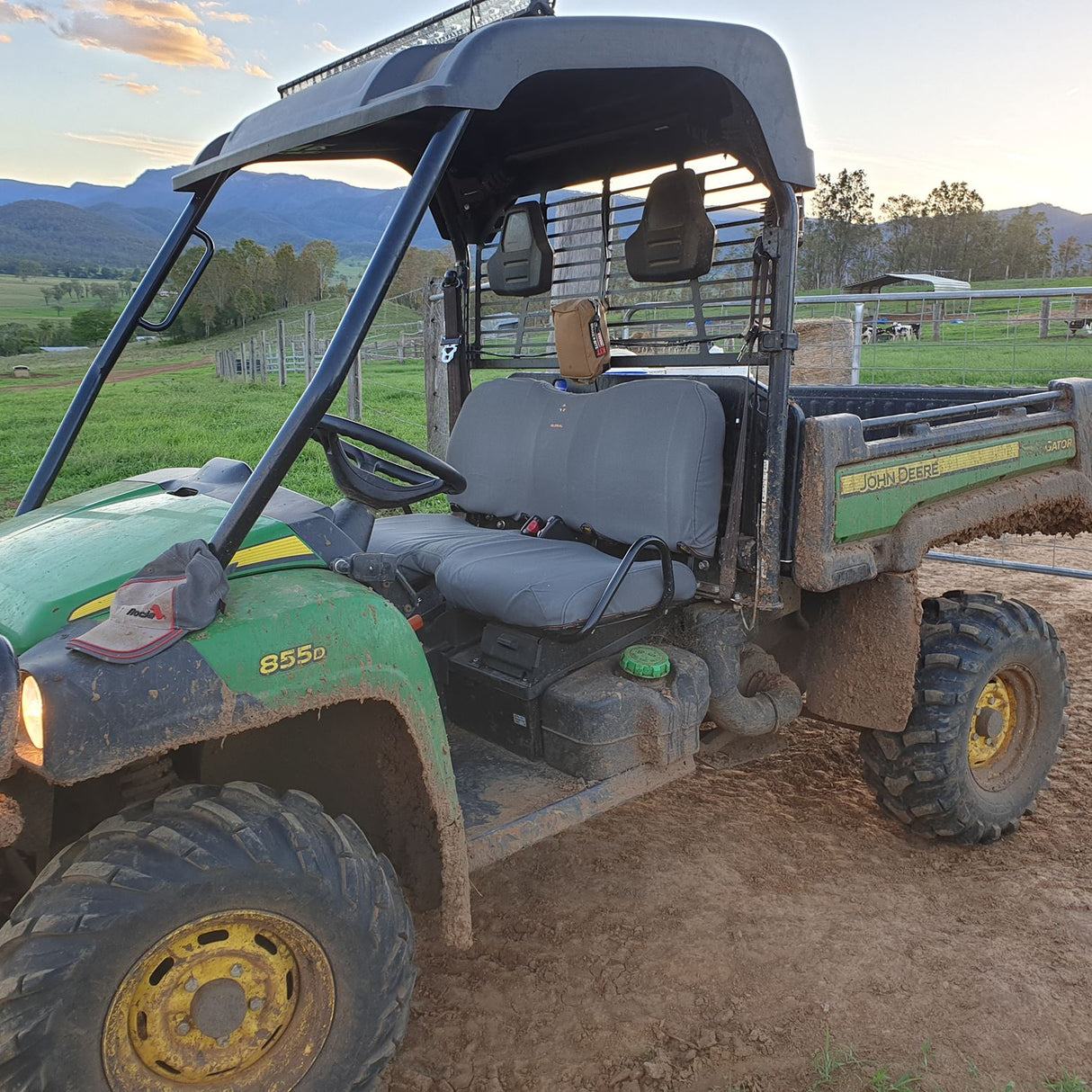 John Deere Gator XUV625/XUV825/XUV850/XUV855 heavy-duty canvas seat cover — four-piece set shown installed