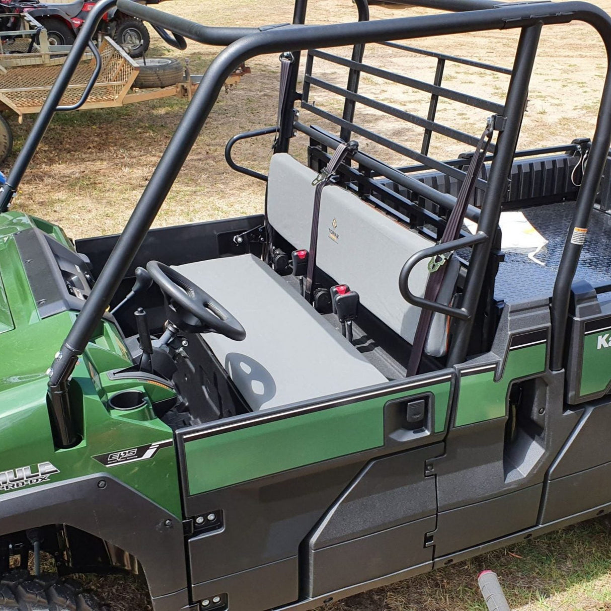 Heavy-duty canvas seat cover for Kawasaki KAF820, KAF1000 PRO FXT, KAF1000 DX Mule seats and rear bench, ensuring long-lasting protection and durability.Heavy-duty canvas seat cover for Kawasaki KAF820, KAF1000 PRO FXT, KAF1000 DX Mule seats and rear bench, ensuring long-lasting protection and durability.