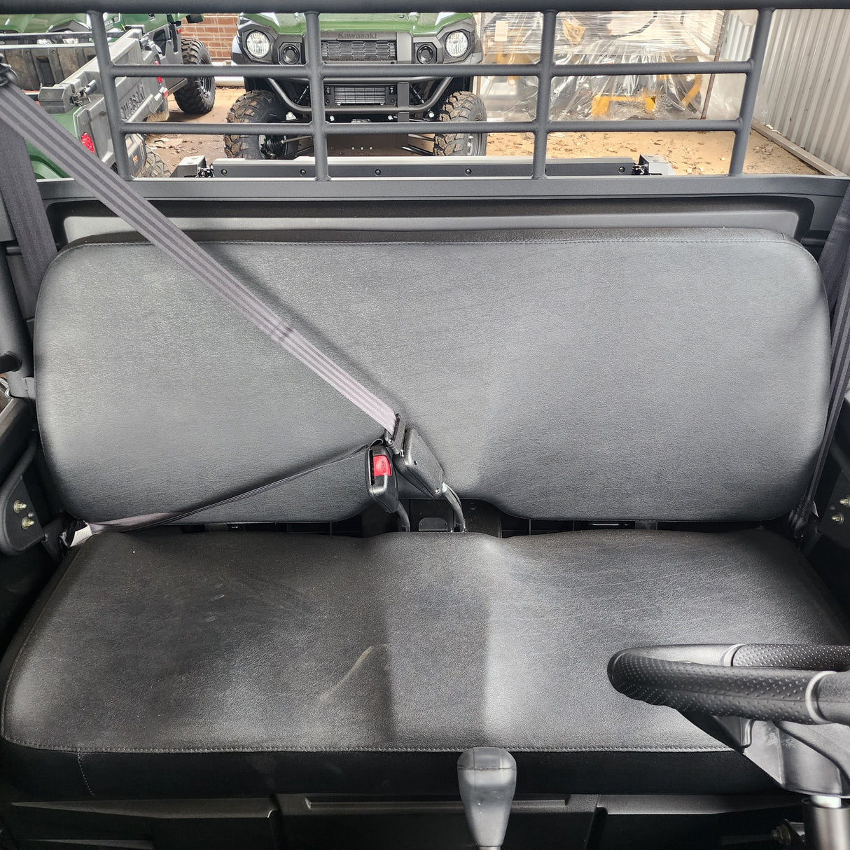 Tough, water-resistant canvas seat cover for Kawasaki Mule PRO MX 700, ideal for off-road and outdoor environments.
