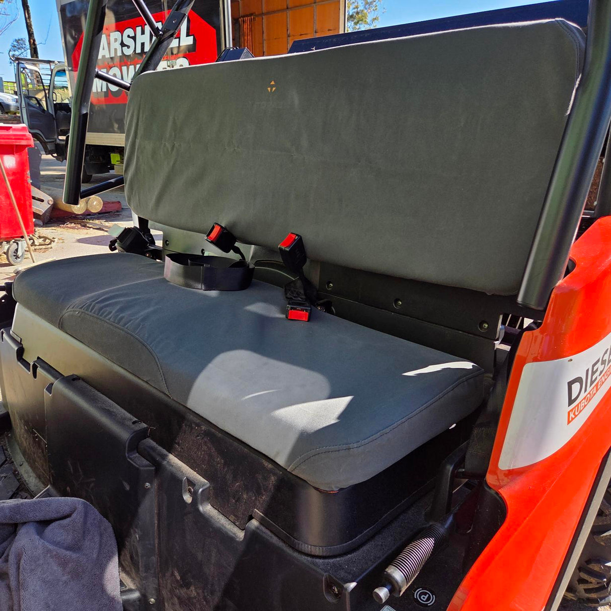 Topaz Global Charcoal canvas seat cover installed on LANDBOSS 800D & 1100D UTV seat.