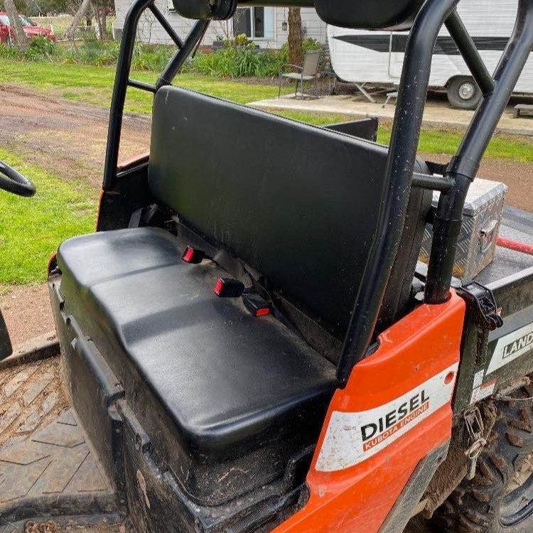 LANDBOSS 800D & 1100D UTV seat before installing the Topaz Global Charcoal canvas seat cover.