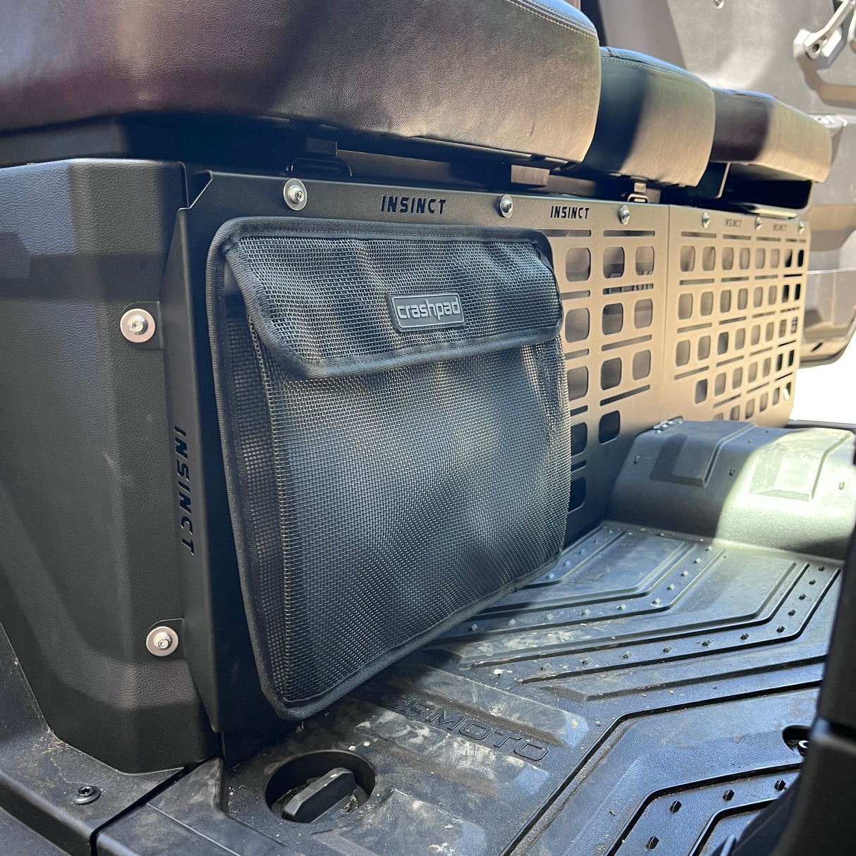Footwell MOLLE panel on a CFMOTO U10 Pro ready for mounting bags, fire extinguishers and quick-access gear.