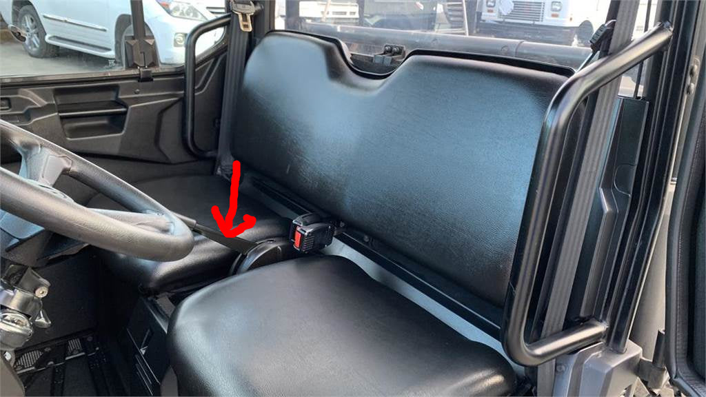 Polaris Ranger 570HD two-seater UTV with red arrow pointing to handbrake between seats in the 2016+ model cabin