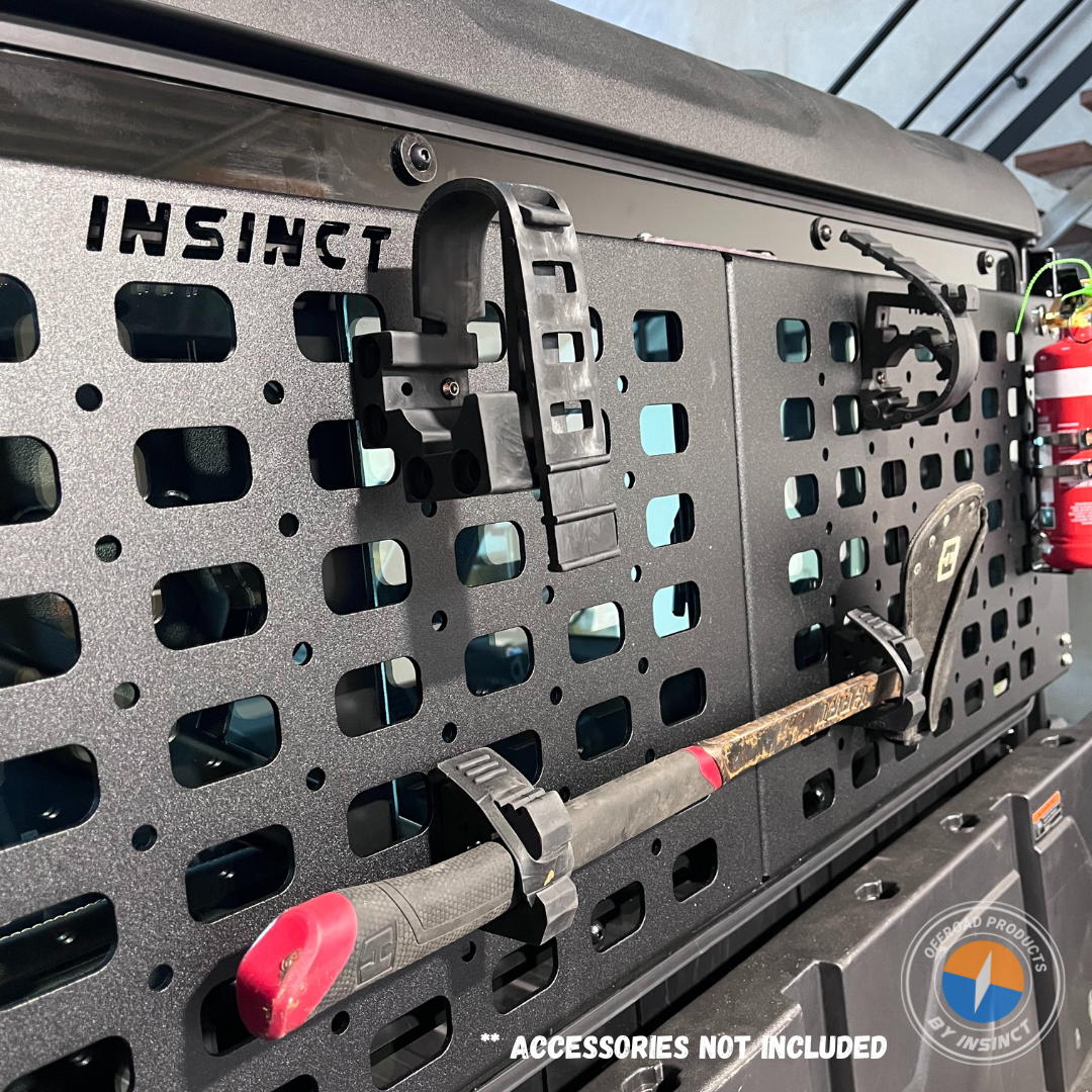 CFMoto U10 Pro MOLLE panel with rifle clamp setup behind cab