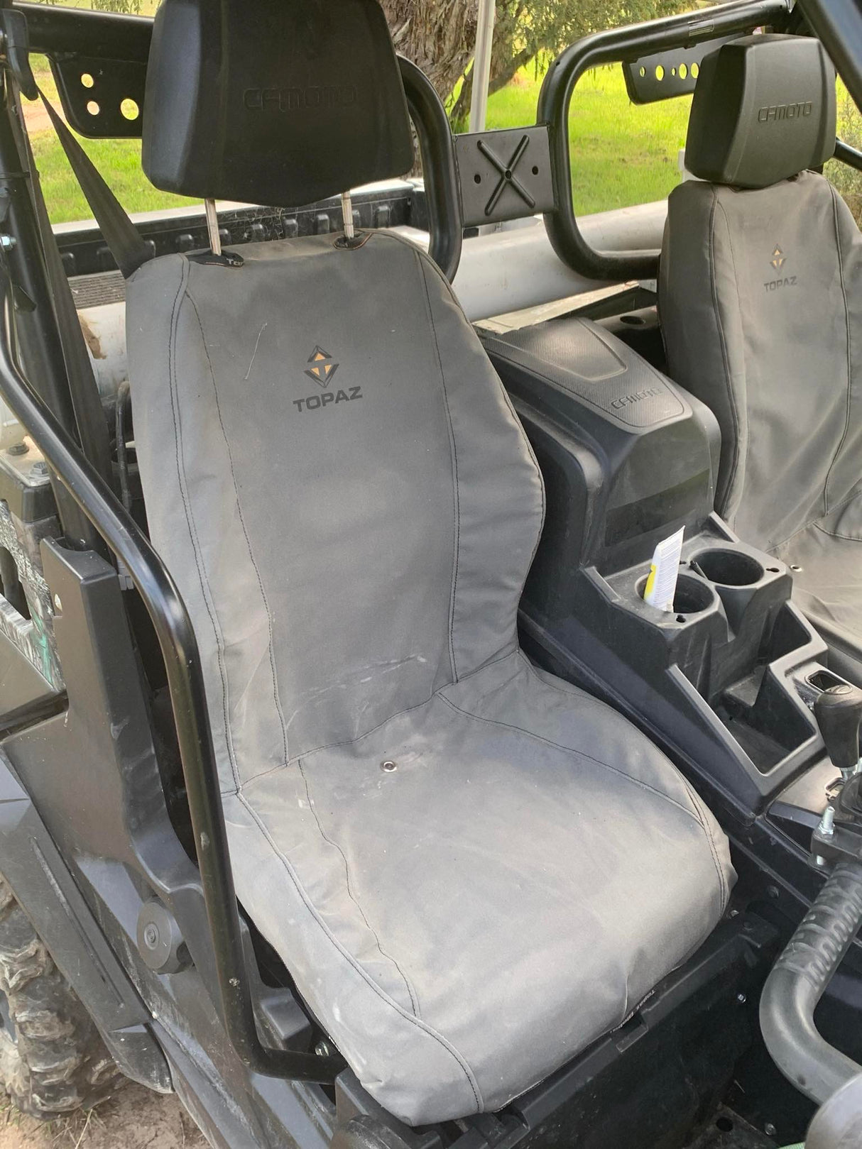 Water-resistant canvas seat covers for the CFMoto UForce 800, providing protection against spills and dirt
