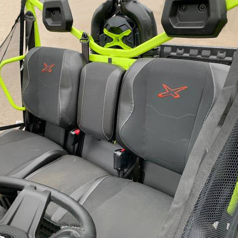 Close-up of heavy-duty canvas seat covers on Can-Am Defender X MR/XT-P bolstered seats, showcasing water-resistant and UV-protected material.