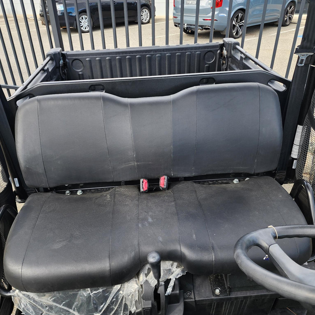 John Deere Gator XUV855M — showing driver and passenger seating, ideal for reference