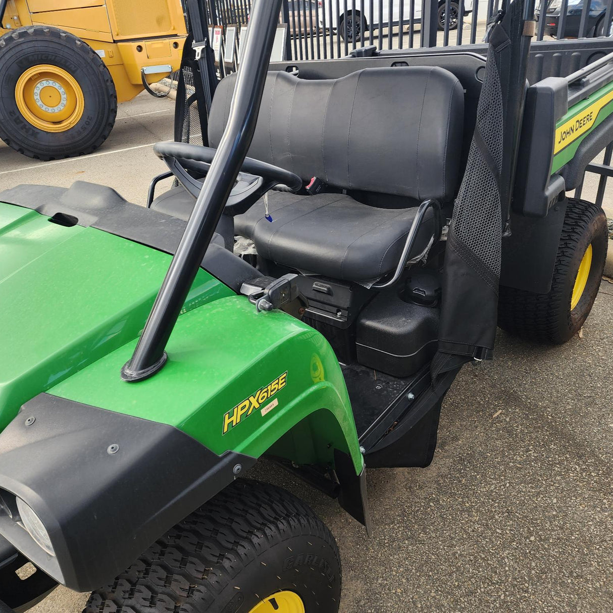 John Deere Gator XUV825M Utility Vehicle in Paddock Setting