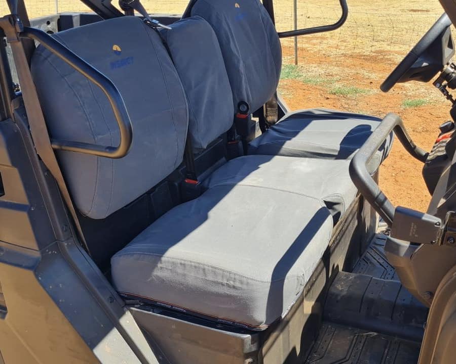 Close-up of water-resistant fabric on the CFMoto U10 Pro/Highland canvas seat covers, built for rugged use.