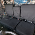 CFMoto UForce 1000 front row Armadillo canvas seat covers installed, heavy-duty seat protection for farming, hunting and recreational use.