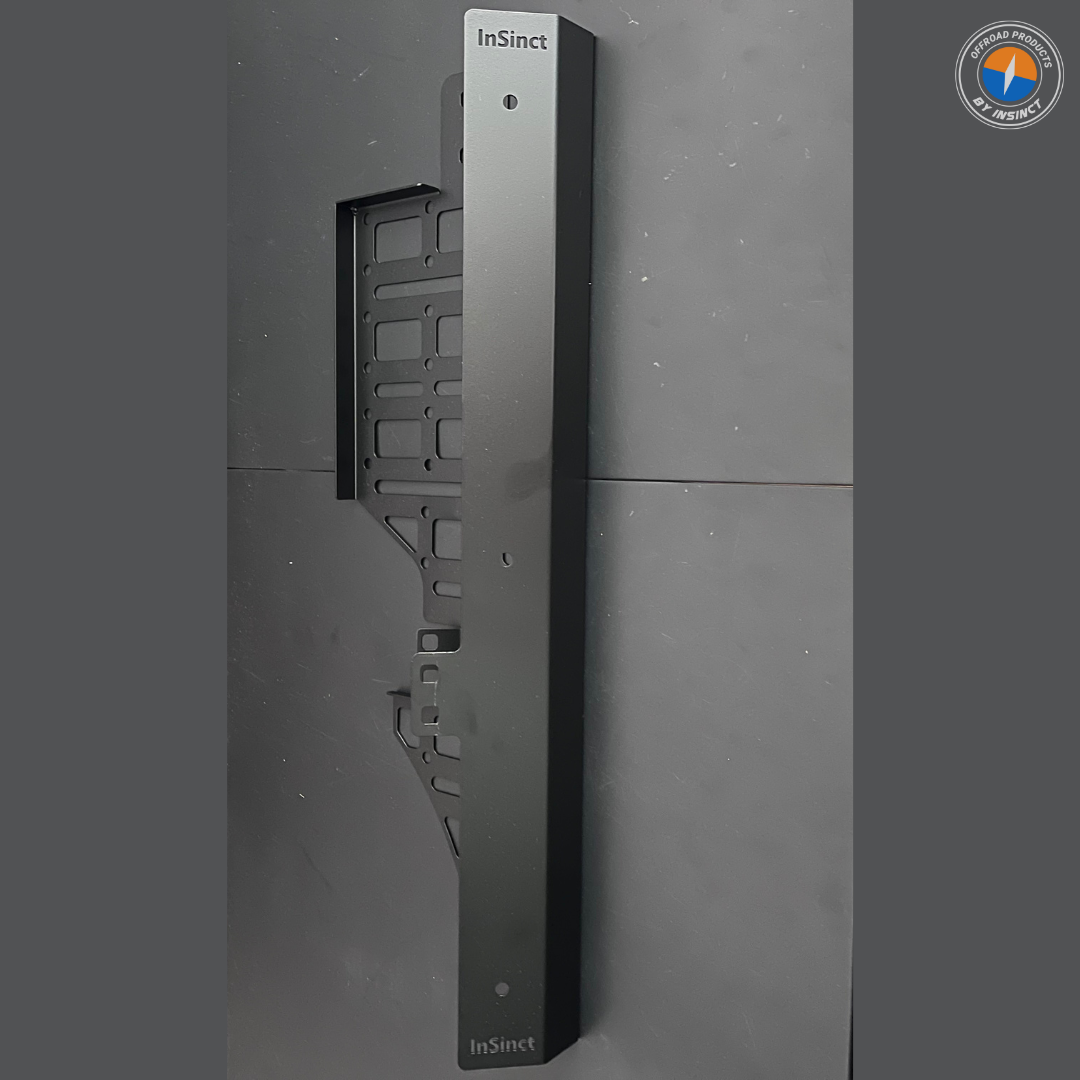 Close-up of the MOLLE grid pattern on the CFMoto UForce 600 drivers side panel for attaching pouches and accessories.