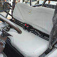 Charcoal canvas seat and backrest cover installed on Honda Pioneer 500 or 520, showing snug fit and rugged material