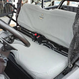 Charcoal canvas seat and backrest cover installed on Honda Pioneer 500 or 520, showing snug fit and rugged material