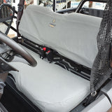 Charcoal canvas seat and backrest cover fitted on Honda Pioneer 700‑2 & 700-4, showing snug fit and heavy-duty material