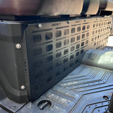 Close-up view of the installed MOLLE panel on a CFMOTO U10 Highland showing powder-coated finish and mounting points.