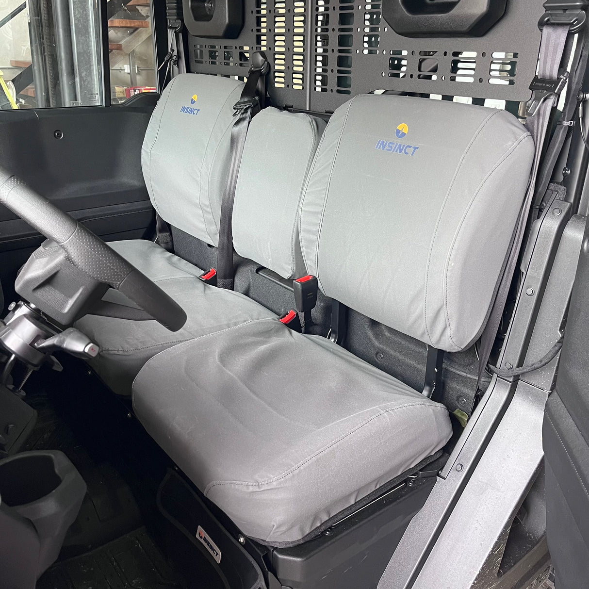 InSinct canvas seat covers fitted to a CFMOTO U10 Pro and Highland protecting the front seats from dirt, mud and wear