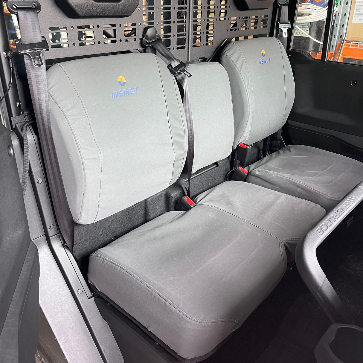 Close-up of InSinct custom fit canvas seat covers for CFMOTO U10 Pro and Highland with reinforced stitching and premium finish