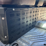 Installed MOLLE panel positioned behind the driver footwell in a CFMOTO U10, highlighting smart use of unused space.