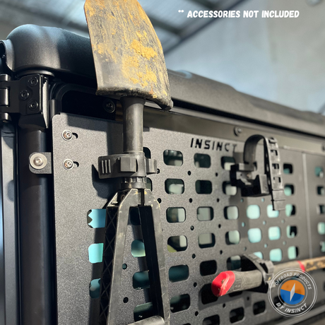 Shovel securely mounted to rear MOLLE panel on CFMoto U10 Pro