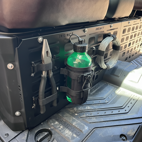 MOLLE panel fitted on a CFMOTO U10 Pro with pliers, water bottle and fencing wire