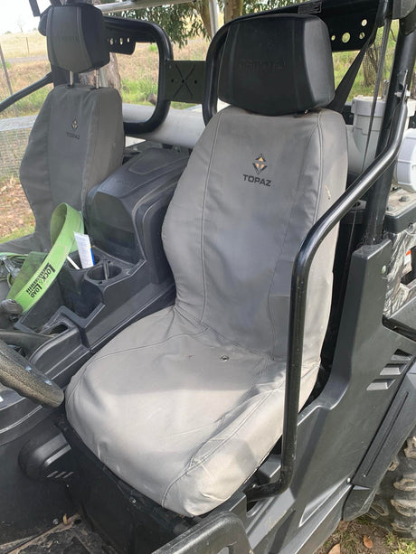 Custom-fit canvas seat covers for the CFMoto UForce 800, showcasing water-resistant fabric and easy installation.