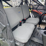 Heavy-duty canvas seat covers installed on CFMoto UForce 600 driver and passenger seats
