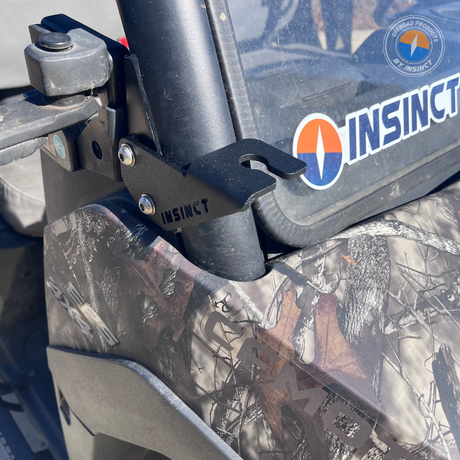 Front-mounted accessory bracket fitted to CFMoto UForce 600 A-pillar