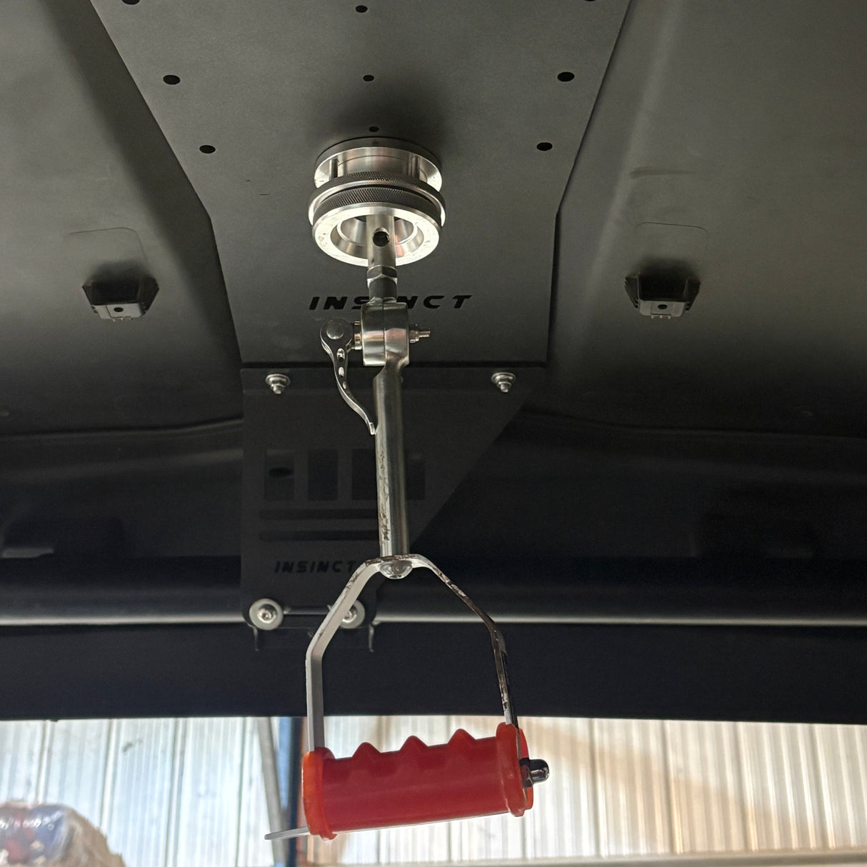 Roof reinforcement plate installed on a CFMoto UForce 600 showing secure mounting support for roof mounted lights.