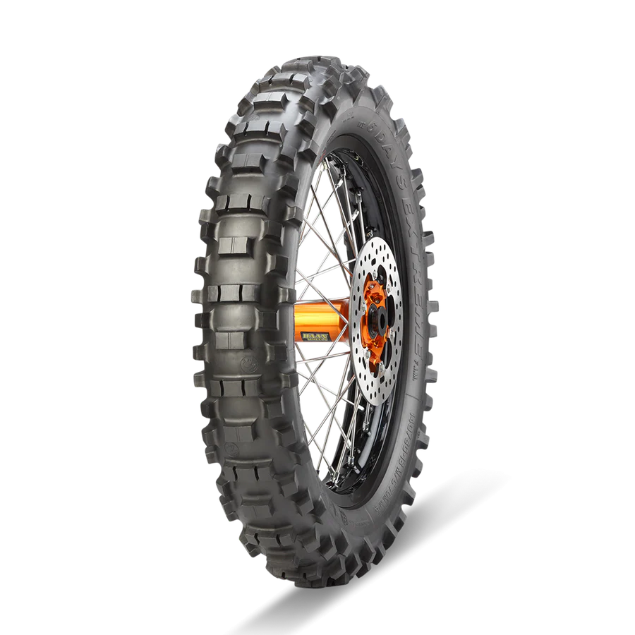 Metzeler MCE 6 Days Extreme Super Soft 140/80-18 rear tyre showing sidewall branding and extreme enduro design
