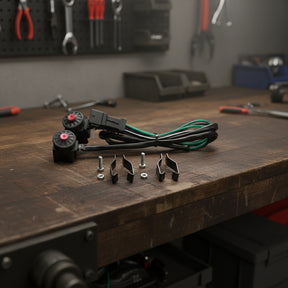 Close-up of start and kill switch housing for 2024 TBI models on workbench